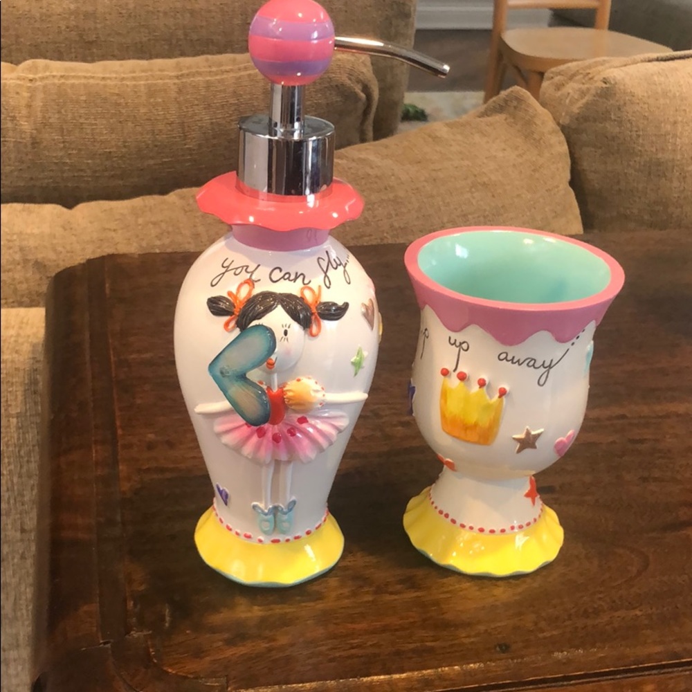 Kids soap dispenser and cup for bathroom.